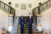  Deputy Secretary Sherman and the Thai Prime Minister stand in front of a decorative staircase.