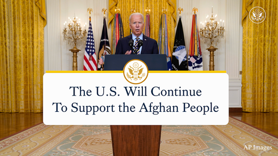 President Biden stands at a podium and speaks, with the words “The U.S. will continue to support the Afghan people.”