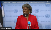 Ambassador Thomas-Greenfield smiling as she speaks against a backdrop of the UN Security Council. 