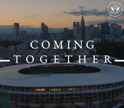 Image of the Tokyo skyline and Olympic stadium with the caption “Coming Together.”