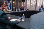Secretary Blinken sits at a table during the U.S.-EU Trade and Technology Council meetings.