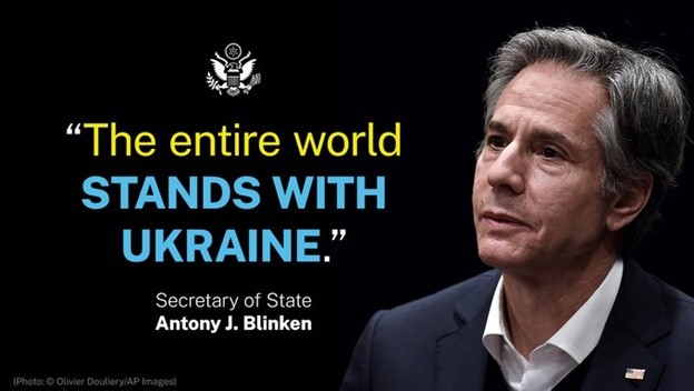 Picture of Secretary Blinken next to the sentence "The entire world Stands With Ukraine"