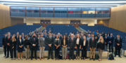 Deputy Secretary of State for Management and Resources Brian McKeon and Director General of the Foreign Service Marcia Bernicat stand with interns.