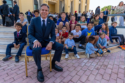  Secretary Blinken poses with children at the U.S. Embassy in Doha.  