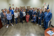 Secretary Blinken in a group photo during the visit to Camp As Sayliyah.