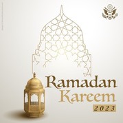A graphic with a geometric design of a mosque, the words "Ramadan Kareem 2023,” a lantern, and the State Department logo. 