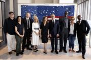 Secretary Blinken and Ambassador Hartley pose for a photo with the cast and producers of Netflix's The Diplomat. 