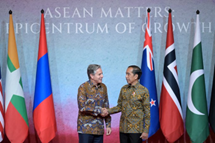 Secretary Blinken is shaking hands with President Joko Widodo.