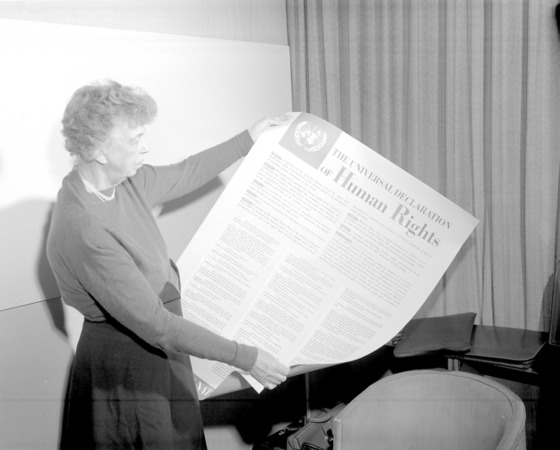 Eleanor Roosevelt holding the UDHR in 1949.