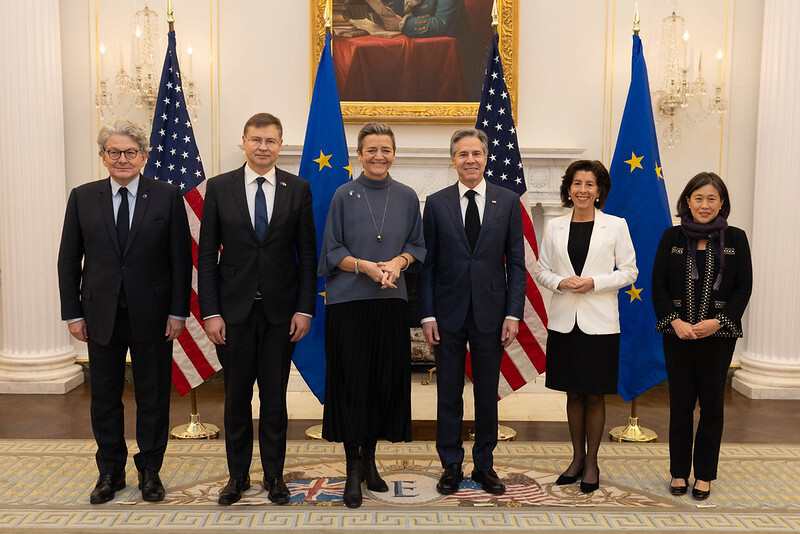 U.S. Secretary of State Antony Blinken, stands between EU and U.S. officials at the U.S.-EU Trade and Technology Council Ministerial Meeting. 