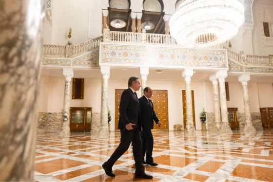 Secretary of State Antony Blinken walks with Egyptian President Abdel Fattah El-Sisi in Cairo, Egypt.