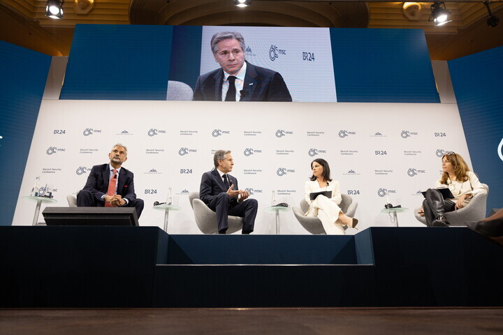 Secretary Blinken sits with German Foreign Minister Baerbock and Indian External Affairs Minister Subrahmanyam Jaishankar.