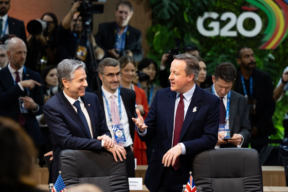 Secretary Blinken talks with British Foreign Minister David Cameron at the G20 Meeting.