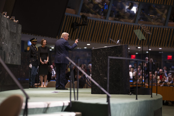 President Trump gestures near a lectern as he addresses the 80th session of the United Nations General Assembly in New York City. 