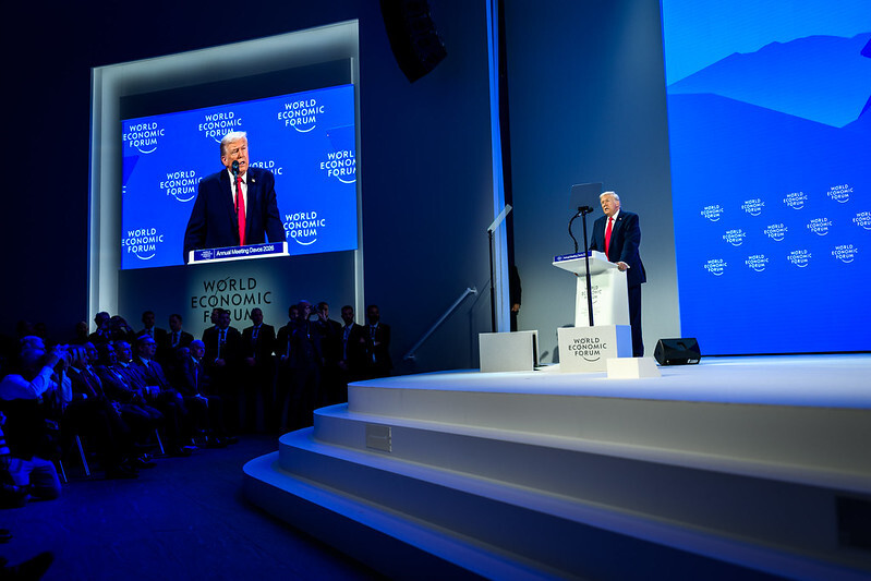 President Trump speaks from behind a lectern at the World Economic Forum.