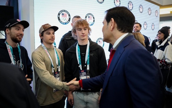 Secretary Rubio shakes hands with Team USA athletes