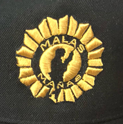 Malas Mañas logo as seen on merchandise.