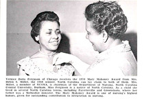 african american va nurse receiving award in nursing