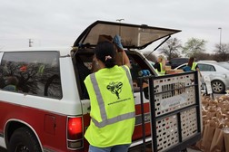 volunteers collecting food for veterans