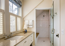 Bathroom interior with wheelchair accessible shower