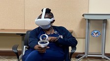 woman wearing virtual reality head set