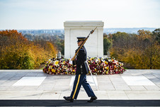 soldier in uniform guarding the tomb of the unknown soldier