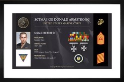 military service plaque of service members photo in uniform with awards and decorations