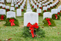 wreaths laying on headstones at arlington national cemetery