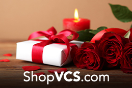 roses, a candle and a present for valentine's day