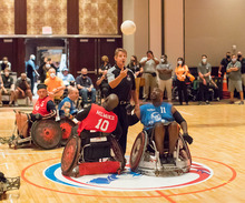 athletes in wheelchairs competing in wheelchair rugby