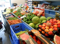 Fruits and vegetables at a produce stand.