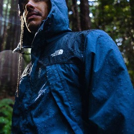 Man in a North Face rain jacket.