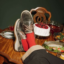 A pair of nice boat shoes with holiday socks.