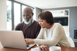 Veteran couple managing their VA pension online