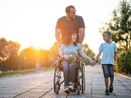 Disabled Veteran with her husband and son