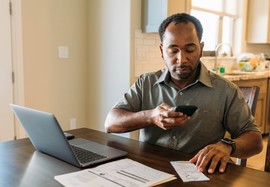 Man managing VA debt online