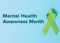 green ribbon against a light blue back next to the words Mental Health Awareness Month