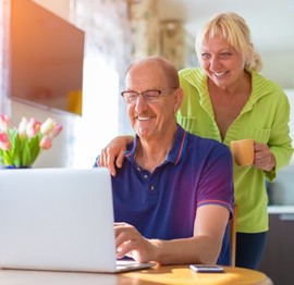 Couple managing their finances online