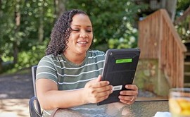 Woman using the online Instant Loan Approval service