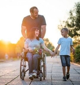 Disabled woman with her husband and child