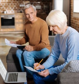 Senior couple reviewing their finances