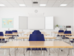 empty classroom with desk chairs