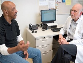 Man talking to his health care provider about his disability ratings