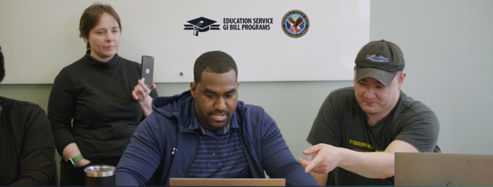School Certifying Officials looking at a computer 