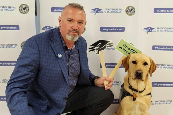 Photo of Brendan Fitzgerald and his Service dog Bob