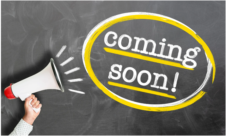 Text "coming soon" in circle next picture of a hand holding a megaphone.