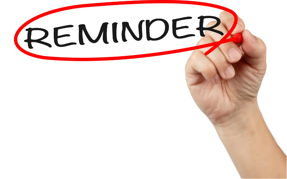 Text "REMINDER" in circle next picture of a hand holding a red marker.
