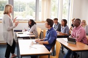 Woman speaking to class