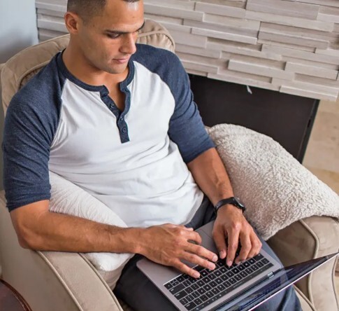 Guy taking VA course on computer