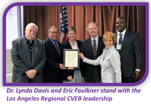 Dr. Lynda Davis and Eric Faulkner stand with the Los Angeles Regional CVEB leadership